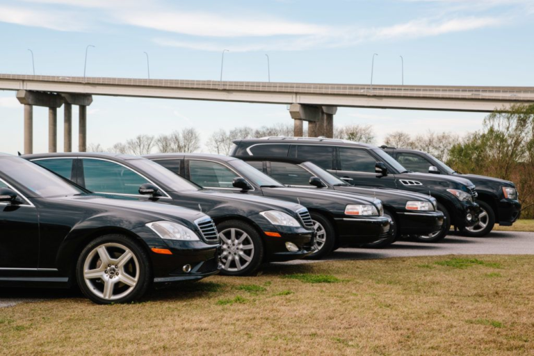 Black Mercedes sedans and SUVs lined up for a wedding party